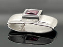 GLEITER AUS 925/- SILBER RHODINIERT MIT RHODOLITH (CA.0,82 ct.)