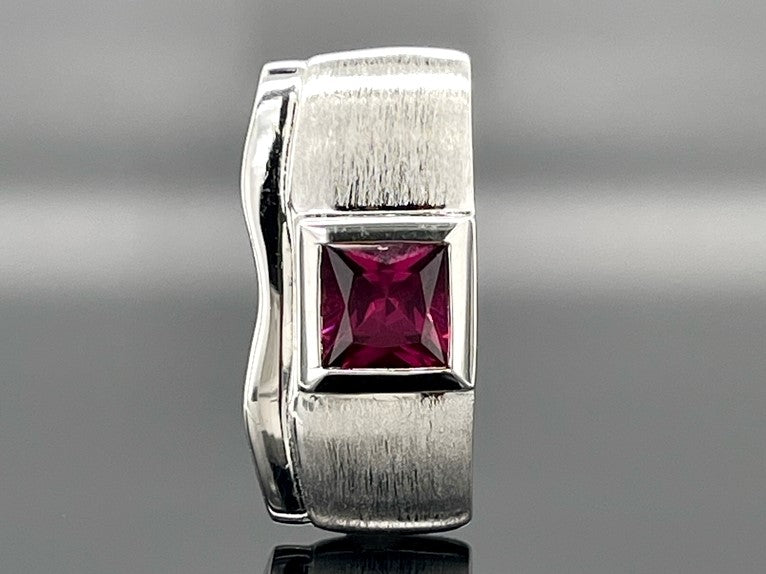 GLEITER AUS 925/- SILBER RHODINIERT MIT RHODOLITH (CA.0,82 ct.)