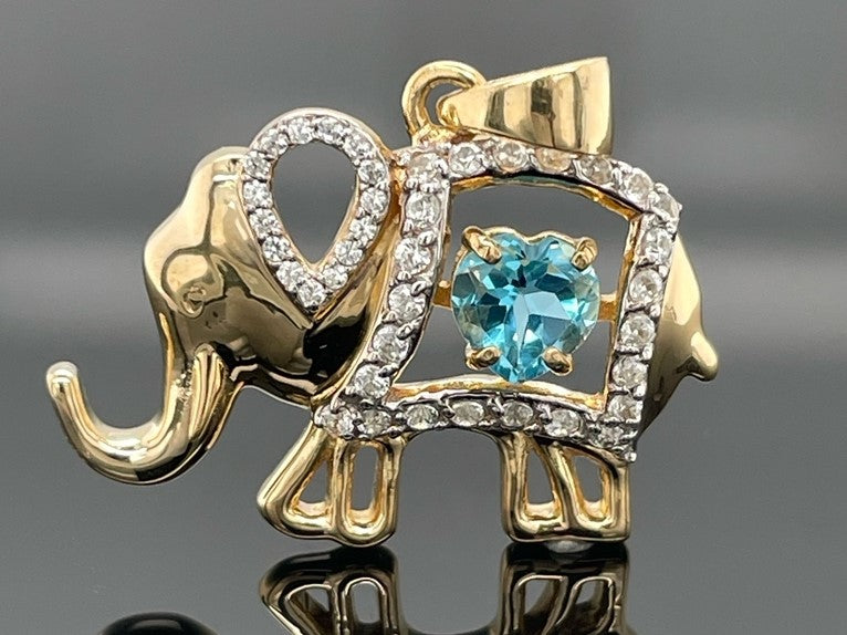 ANHÄNGER AUS 925/- SILBER VERGOLDET MIT BLAUTOPAS BEH. & ZIRKON