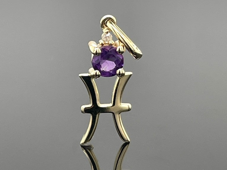 ANHÄNGER "FISCH" AUS 375/- GELBGOLD MIT AMETHYST & DIAMANT (GES. CA. 0,28 ct.)