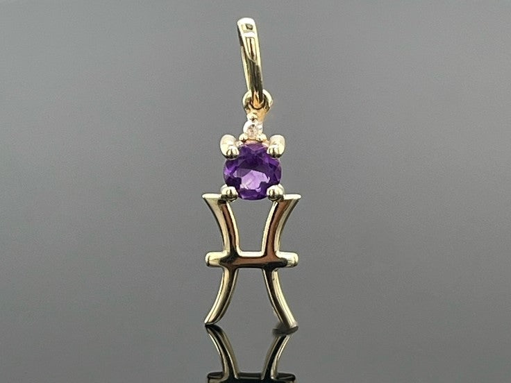 ANHÄNGER "FISCH" AUS 375/- GELBGOLD MIT AMETHYST & DIAMANT (GES. CA. 0,28 ct.)