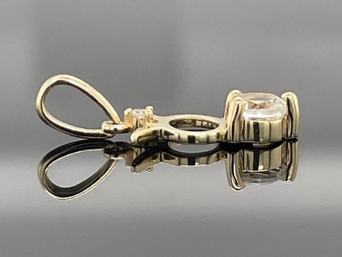 ANHÄNGER "STIER" AUS 375/- GELBGOLD MIT TOPAS & DIAMANT (GES. CA. 0,28 ct.)