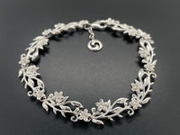 ARMBAND 925/-SILBER RHODINIERT MIT ZIRKON (GES. CA. 0,85 ct.)