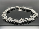 ARMBAND 925/-SILBER RHODINIERT MIT ZIRKON (GES. CA. 0,85 ct.)