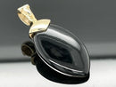 CLIP ANHÄNGER AUS 375/- GELBGOLD MIT BERGKRISTALL/ONYX/BLATTGOLD-DUBL. BEH. (CA. 13,0 ct.)