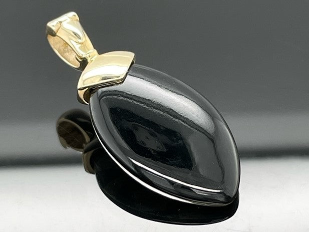 CLIP ANHÄNGER AUS 375/- GELBGOLD MIT BERGKRISTALL/ONYX/BLATTGOLD-DUBL. BEH. (CA. 13,0 ct.)