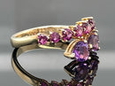 RING AUS 375/- GELBGOLD MIT AMETHYST & RHODOLITH (GES.CA.3,005 ct.)