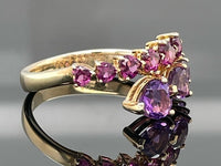 RING AUS 375/- GELBGOLD MIT AMETHYST & RHODOLITH (GES.CA.3,005 ct.)