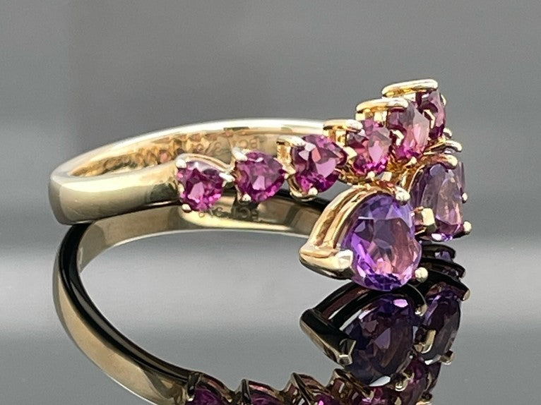 RING AUS 375/- GELBGOLD MIT AMETHYST & RHODOLITH (GES.CA.3,005 ct.)