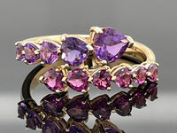 RING AUS 375/- GELBGOLD MIT AMETHYST & RHODOLITH (GES.CA.3,005 ct.)