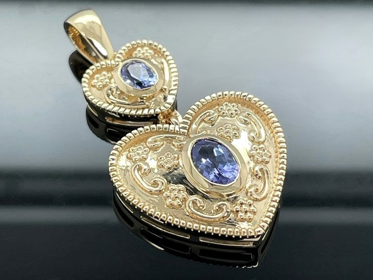 ANHÄNGER AUS 925/- SILBER VERGOLDET MIT TANSANIT AAA+ (GES. CA. 0,56ct.)