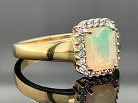 RING AUS 925/- SILBER VERGOLDET MIT ÄTHIOP. OPAL & ZIRKON