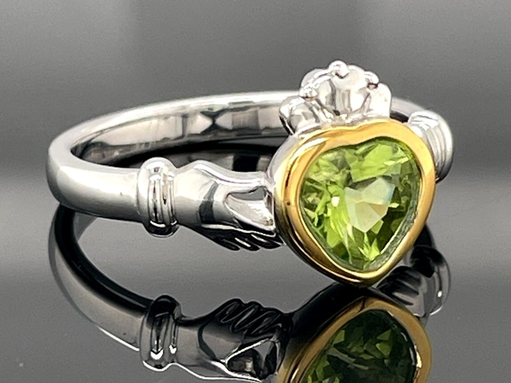 RING AUS 925/- SILBER BICOLOR MIT PERIDOT (CA. 0,62 ct.)