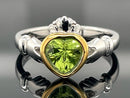 RING AUS 925/- SILBER BICOLOR MIT PERIDOT (CA. 0,62 ct.)
