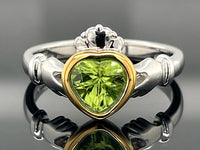 RING AUS 925/- SILBER BICOLOR MIT PERIDOT (CA. 0,62 ct.)