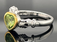 RING AUS 925/- SILBER BICOLOR MIT PERIDOT (CA. 0,62 ct.)