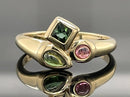 RING AUS 375/- GELBGOLD MIT MULTI TURMALIN (GES.CA 0,41 ct.)