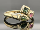 RING AUS 375/- GELBGOLD MIT MULTI TURMALIN (GES.CA 0,41 ct.)