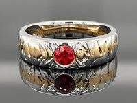RING AUS 375/- GOLD BICOLOR MIT SAPHIR ROT (ca. 0,33 ct.)