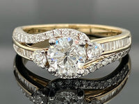 RING AUS 585/- GELBGOLD MIT DIAMANTEN  (GES.CA.1,50 ct.)