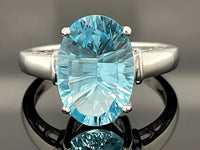 RING AUS 925/- SILBER RHODINIERT MIT SWISS BLUE TOPAS (CA.5,5 ct.)