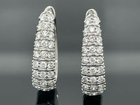 CREOLEN AUS 950/- PLATIN MIT BRILLANT SI1 (ges. ca.0,75 ct.)
