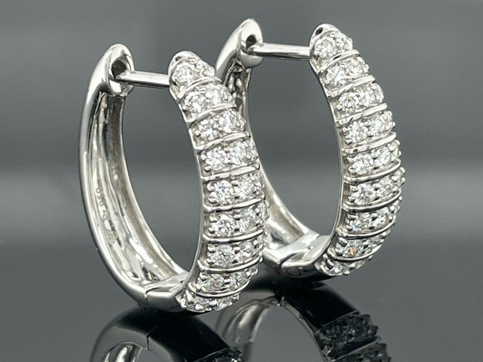 CREOLEN AUS 950/- PLATIN MIT BRILLANT SI1 (ges. ca.0,75 ct.)