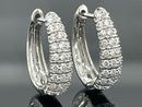 CREOLEN AUS 950/- PLATIN MIT BRILLANT SI1 (ges. ca.0,75 ct.)