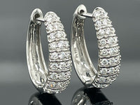 CREOLEN AUS 950/- PLATIN MIT BRILLANT SI1 (ges. ca.0,75 ct.)