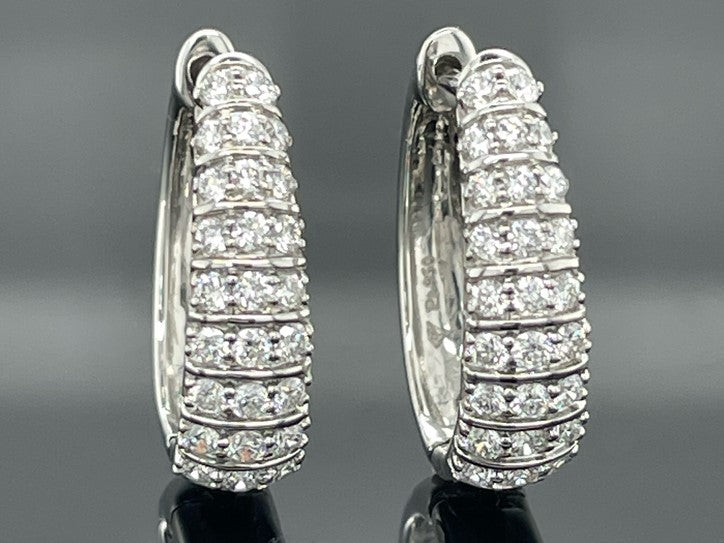 CREOLEN AUS 950/- PLATIN MIT BRILLANT SI1 (ges. ca.0,75 ct.)