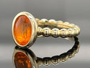RING AUS 375/- GELBGOLD MIT FEUEROPAL (CA. 0,66 ct.)