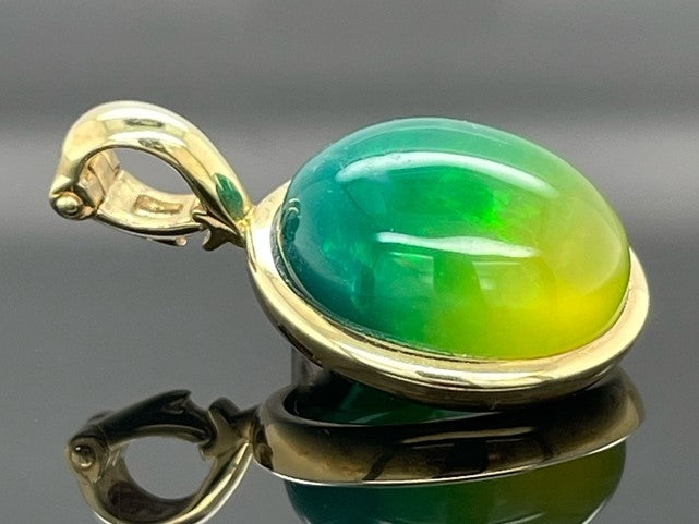 CLIP ANHÄNGER AUS 925/- SILBER VERGOLDET MIT KRISTALLOPAL BEH. (CA.3,90 ct.)