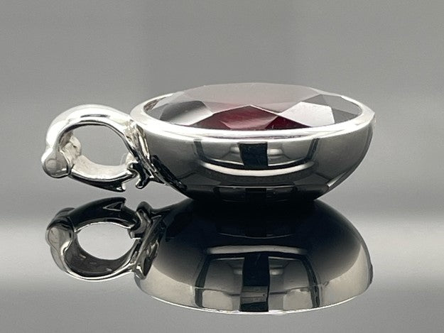 ANHÄNGER AUS 950/- PLATIN MIT RHODOLITH (CA. 10,0 ct.)