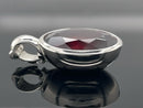 ANHÄNGER AUS 950/- PLATIN MIT RHODOLITH (CA. 10,0 ct.)