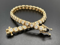 ARMBAND AUS 585/- GELBGOLD MIT BRILLANTEN LR ( GES. CA. 1,65 ct.)