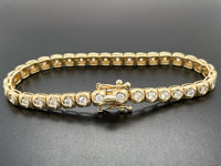 ARMBAND AUS 585/- GELBGOLD MIT BRILLANTEN LR ( GES. CA. 1,65 ct.)
