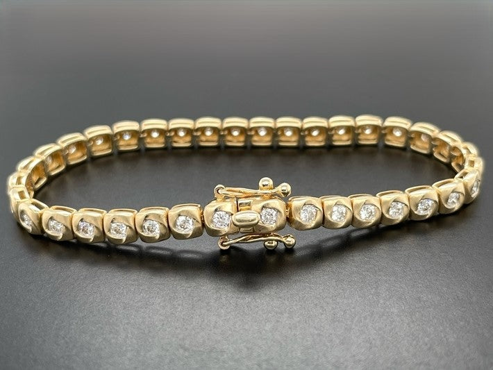 ARMBAND AUS 585/- GELBGOLD MIT BRILLANTEN LR ( GES. CA. 1,65 ct.)