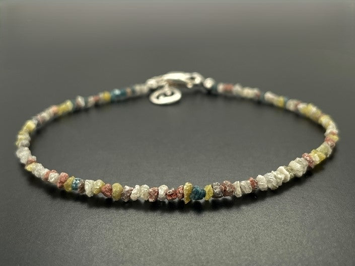 ARBAND 925/- SILBER RHODINIERT MIT MULTI ROHDIAMANT BEH. (GES. CA. 6,0 ct.)