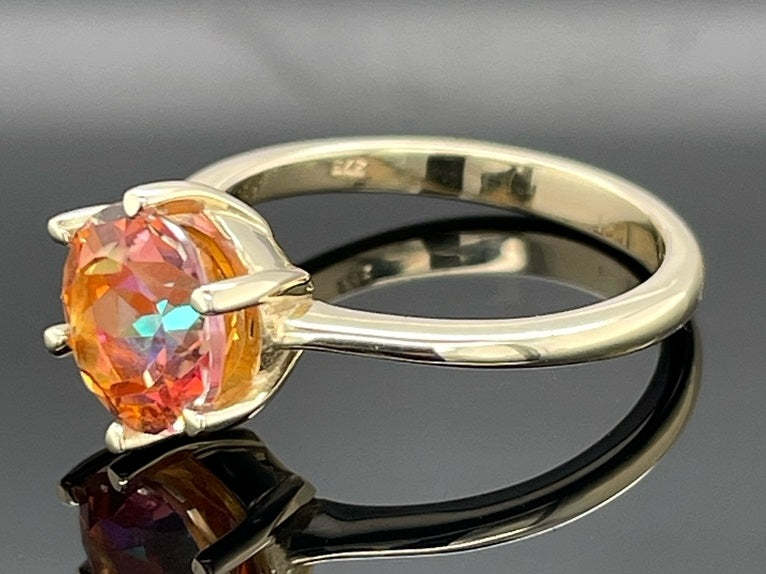 RING GR. 17 (CA.53) AUS 375/- GELBGOLD MIT TOPAS BEH.