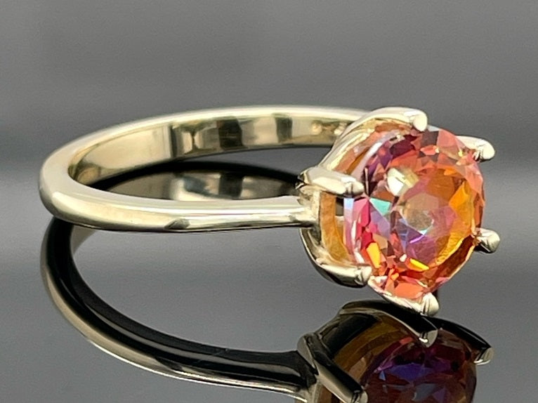 RING GR. 17 (CA.53) AUS 375/- GELBGOLD MIT TOPAS BEH.