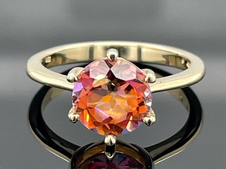 RING GR. 17 (CA.53) AUS 375/- GELBGOLD MIT TOPAS BEH.