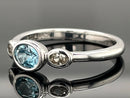 RING AUS 925/- SILBER RHOD. MIT MIT "SANTA MARIA" AQUAMARIN & ZIRKON (ges.ca. 0,49 ct.)