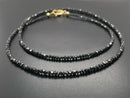 COLLIER 375/- GELBGOLD MIT DIAMANTEN BEH. SCHWARZ