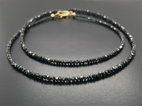 COLLIER 375/- GELBGOLD MIT DIAMANTEN BEH. SCHWARZ