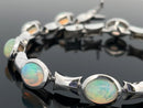 ARMBAND AUS 375/- WEISSGOLD mit Kristallopal (ca. 4,50 ct.)