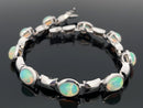 ARMBAND AUS 375/- WEISSGOLD mit Kristallopal (ca. 4,50 ct.)