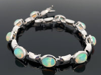 ARMBAND AUS 375/- WEISSGOLD mit Kristallopal (ca. 4,50 ct.)