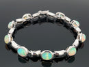 ARMBAND AUS 375/- WEISSGOLD mit Kristallopal (ca. 4,50 ct.)