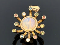 ANHÄNGER AUS 375/- GELBGOLD mit Kristallopal und Multi Brillanten (ca. 0,156 ct.)