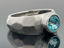 RING AUS 925/- SILBER RHODINIERT MIT TOPAS (BEH.) PARAIBAFARBEN (CA. 0,9 ct.)